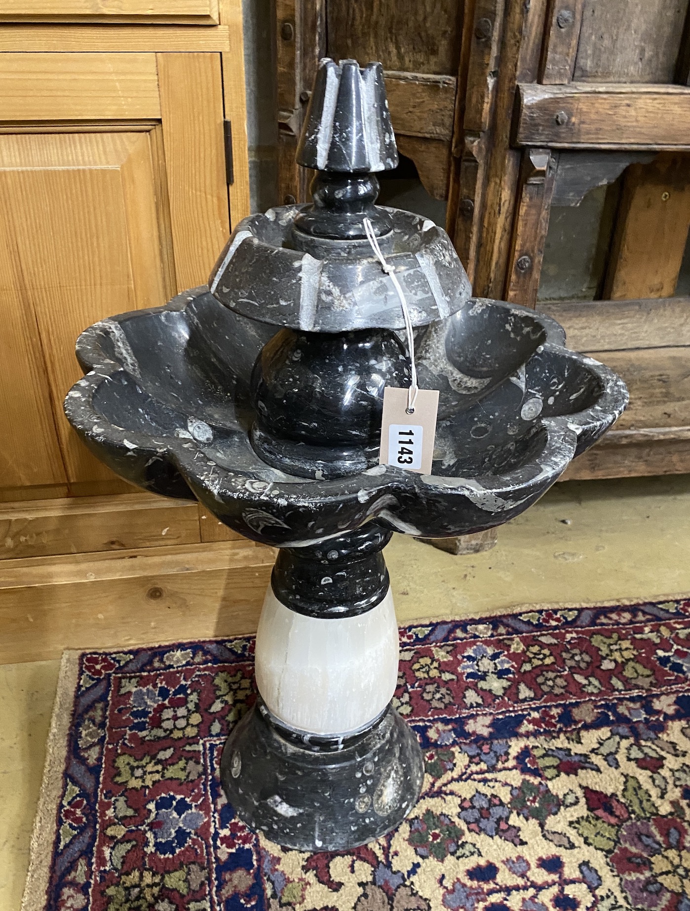 A small marble and fossil fountain, height 65cm